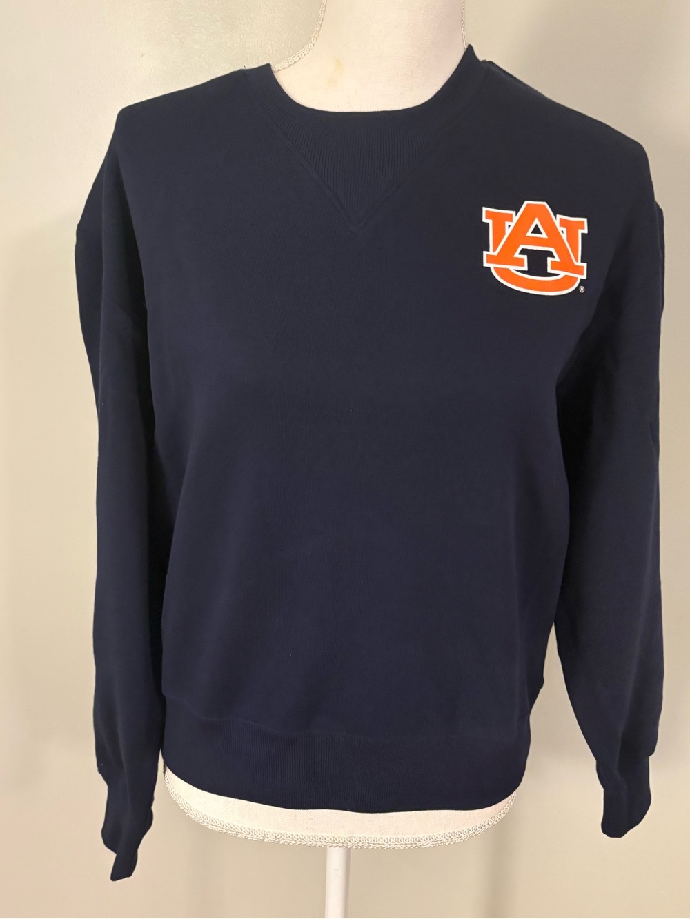 Rivalry Threads Navy Crewneck with Orange Logo Accent
